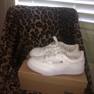 White Reebok classics.